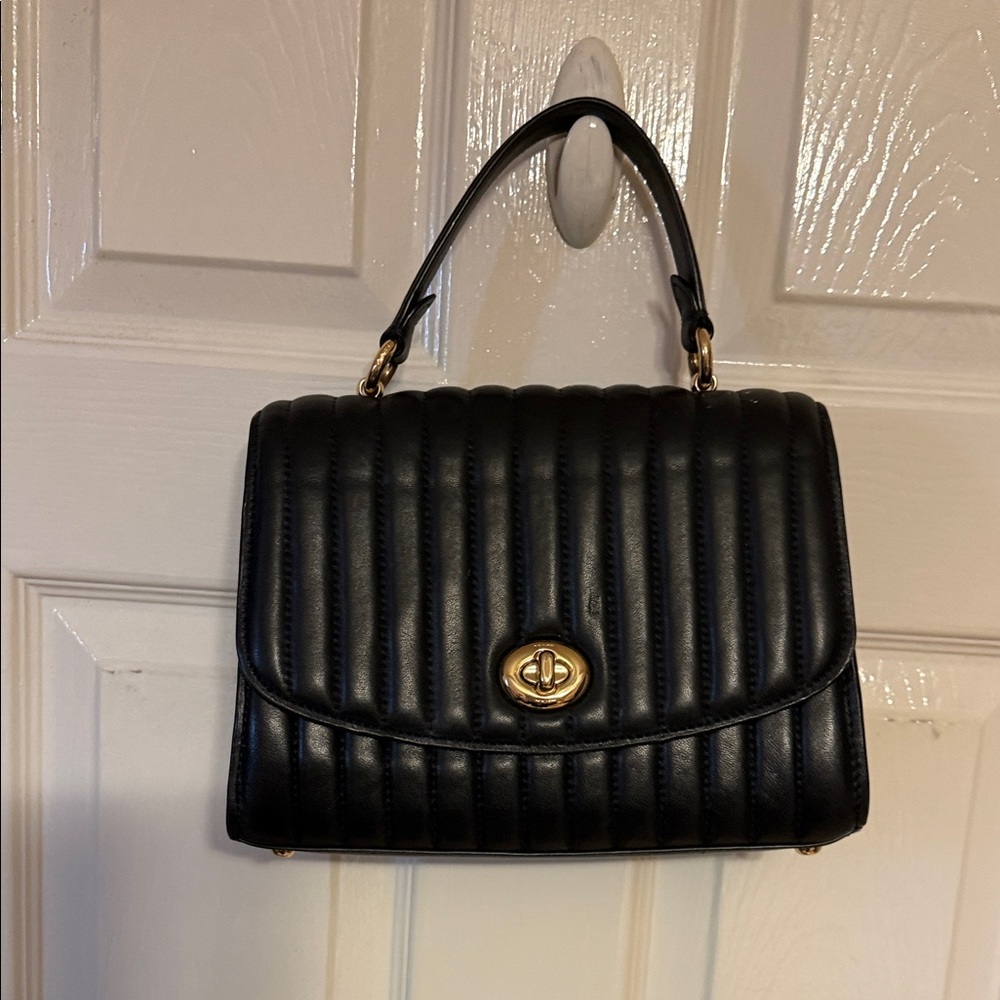 Elegant Black Quilted Coach Handbag